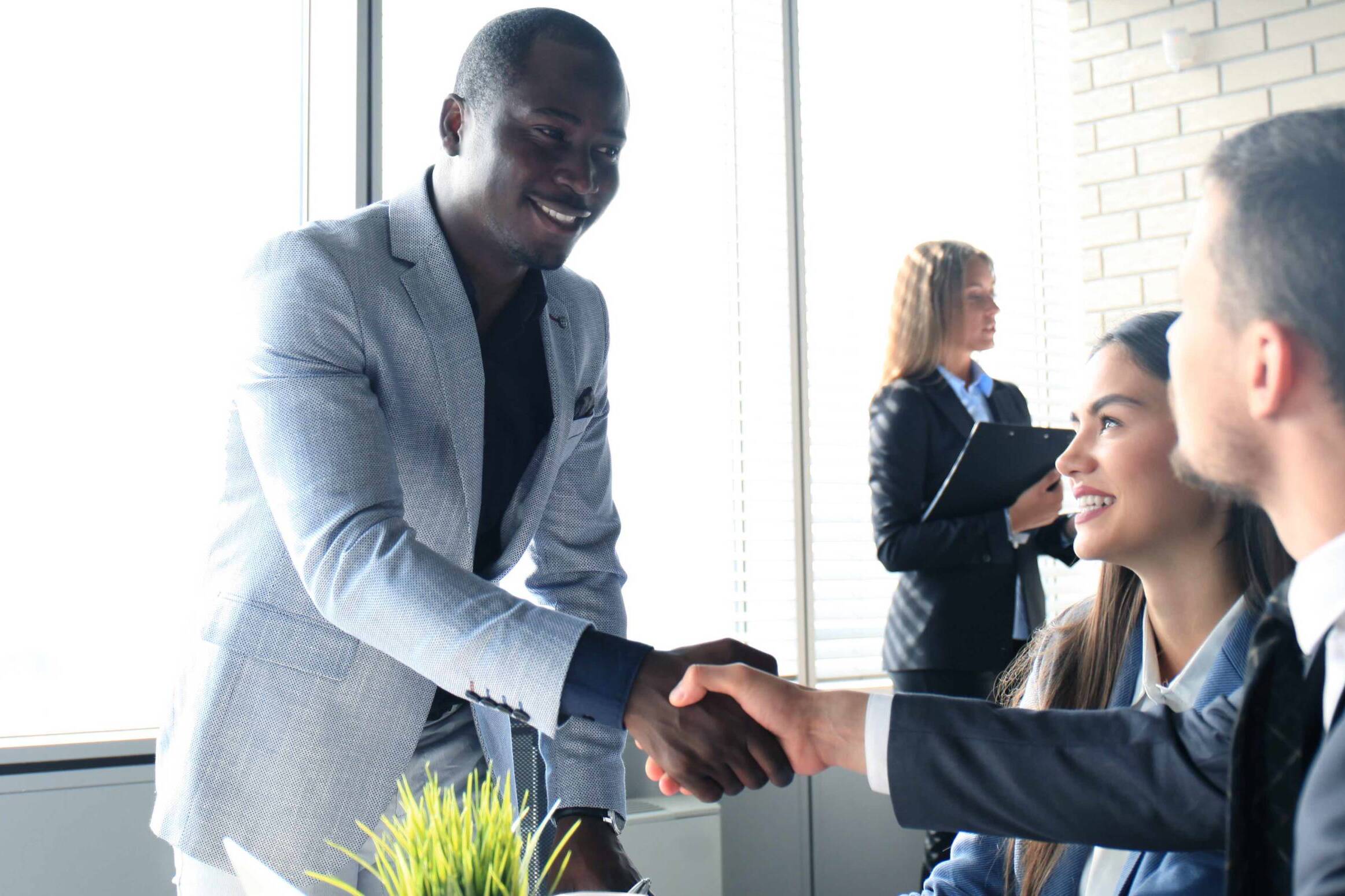 Job applicant having interview. Handshake while job interviewing