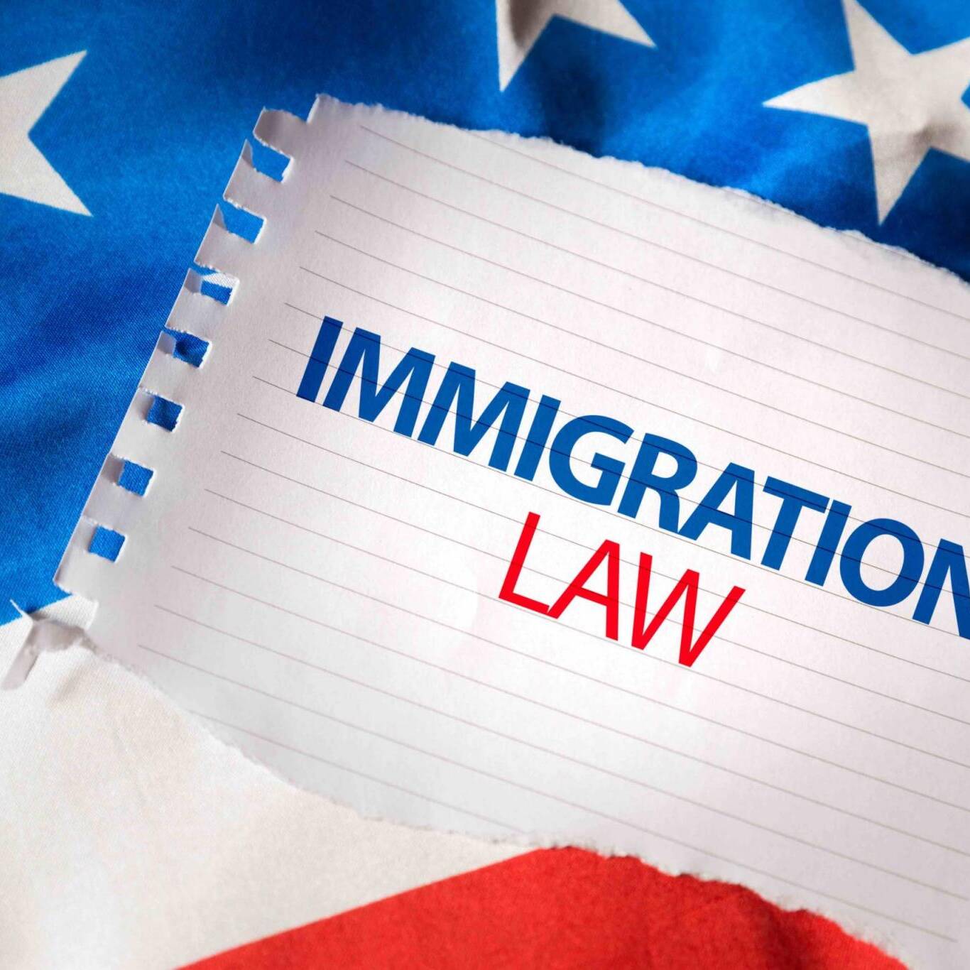 Immigration Law on notepaper and the US flag