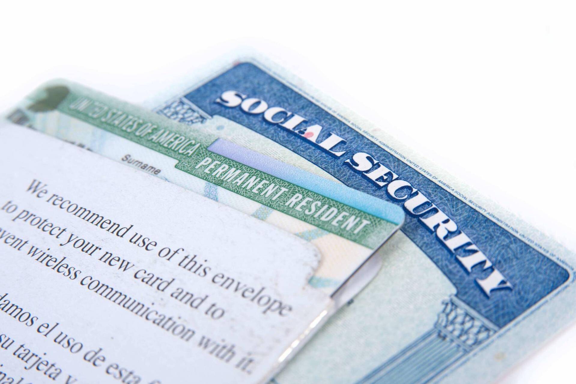 United States of America social security and green card on white background