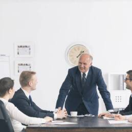 Corporate meeting with a relaxed boss