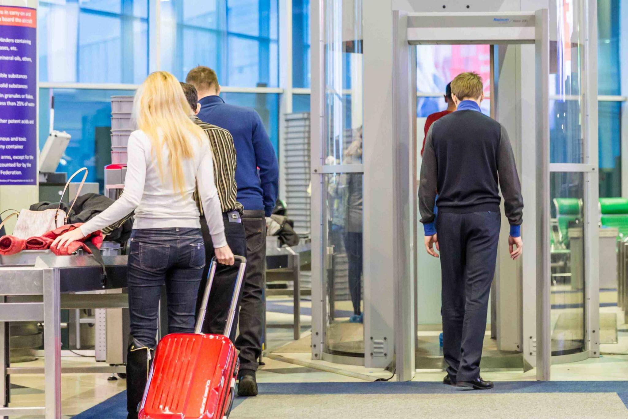 MOSCOW NOVEMBER 23, 2013: people in the hall of the airport Domodedovo November 23, 2014 in Moscow. Domodedovo airport the largest and modern airport of Russia