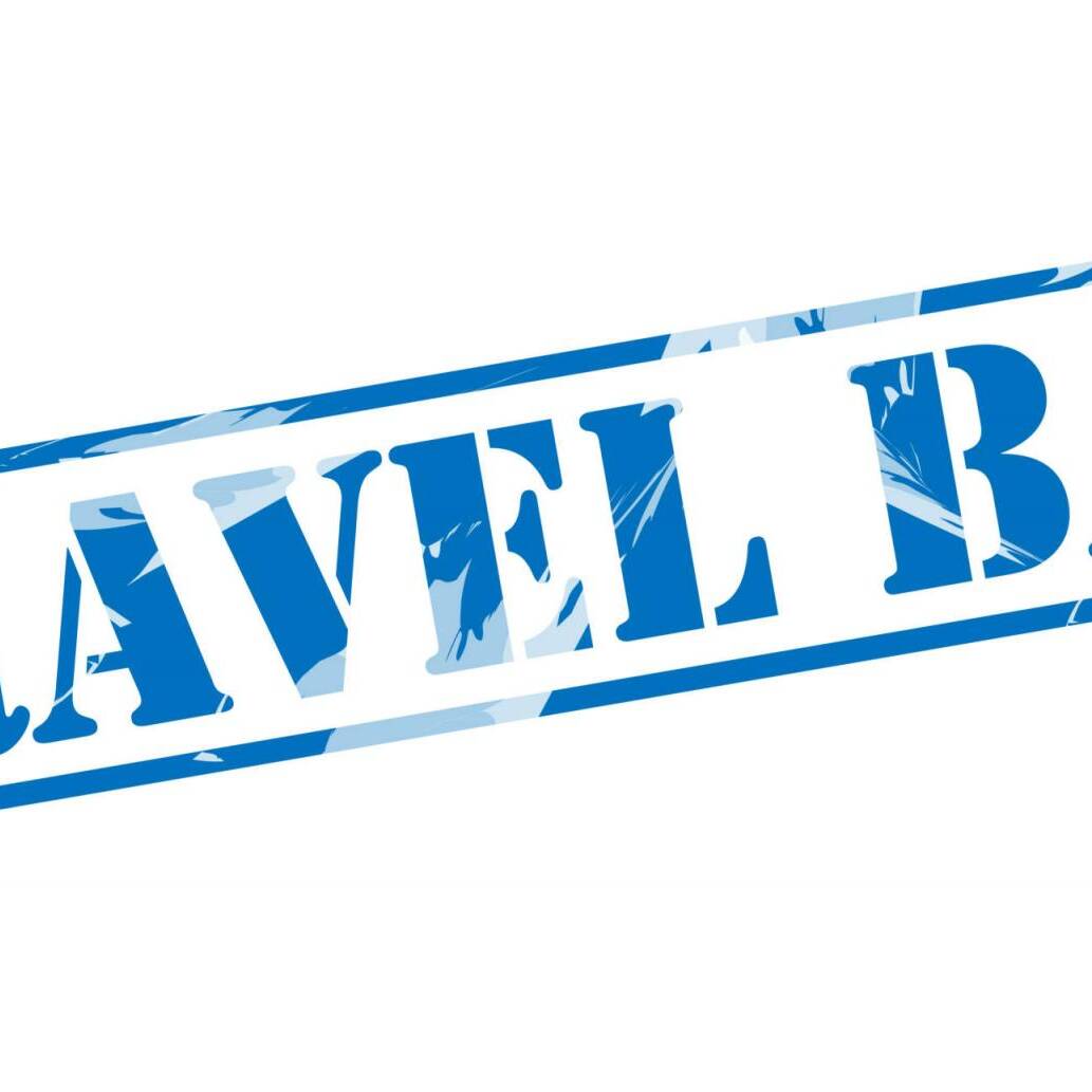 travel ban blue stamp on white background