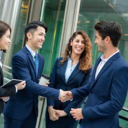 Group of business people make a deal