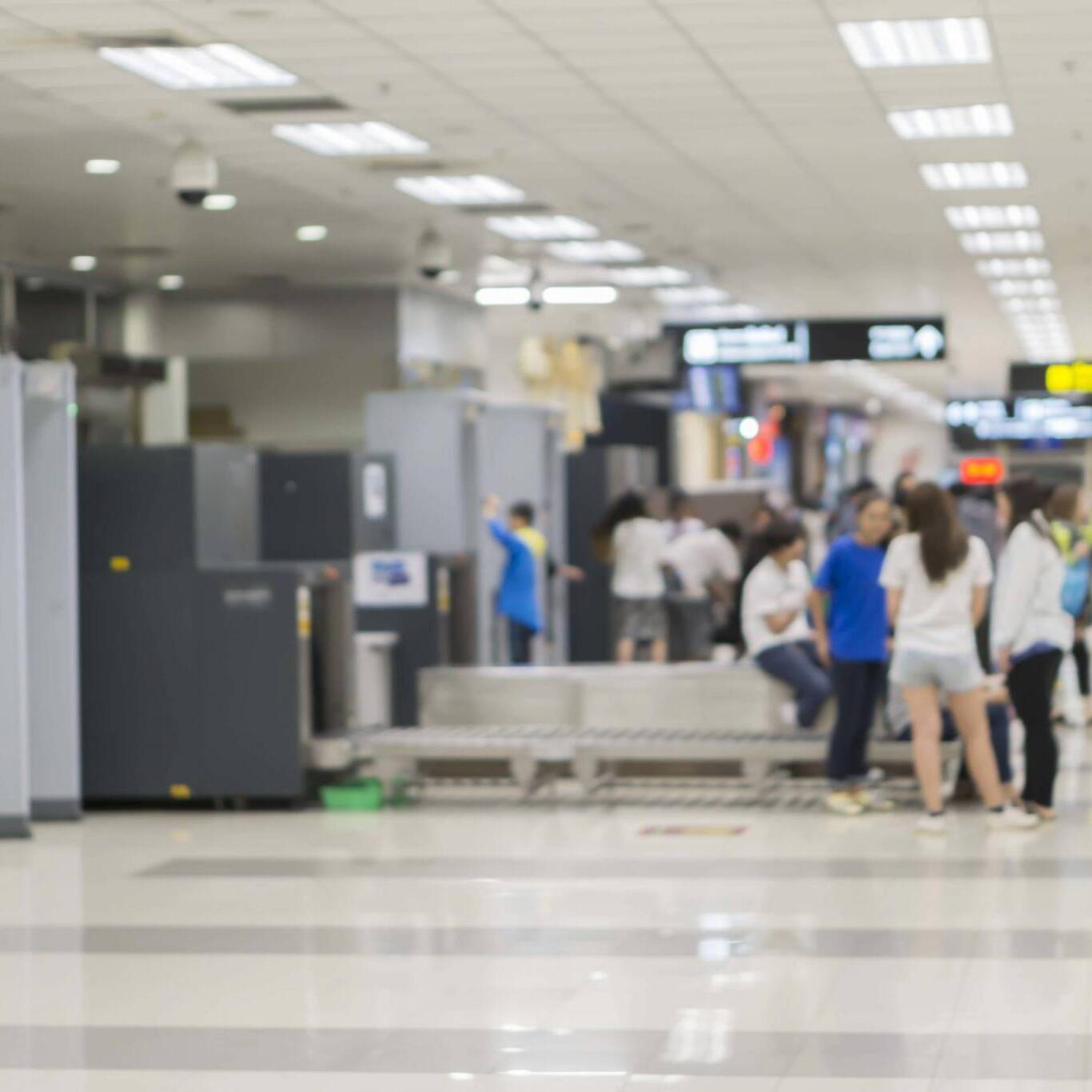 TSA,Security Checkpoint,Airport Check In ,Security Body and Luggage Scan Machine ,vintage color,blurred background