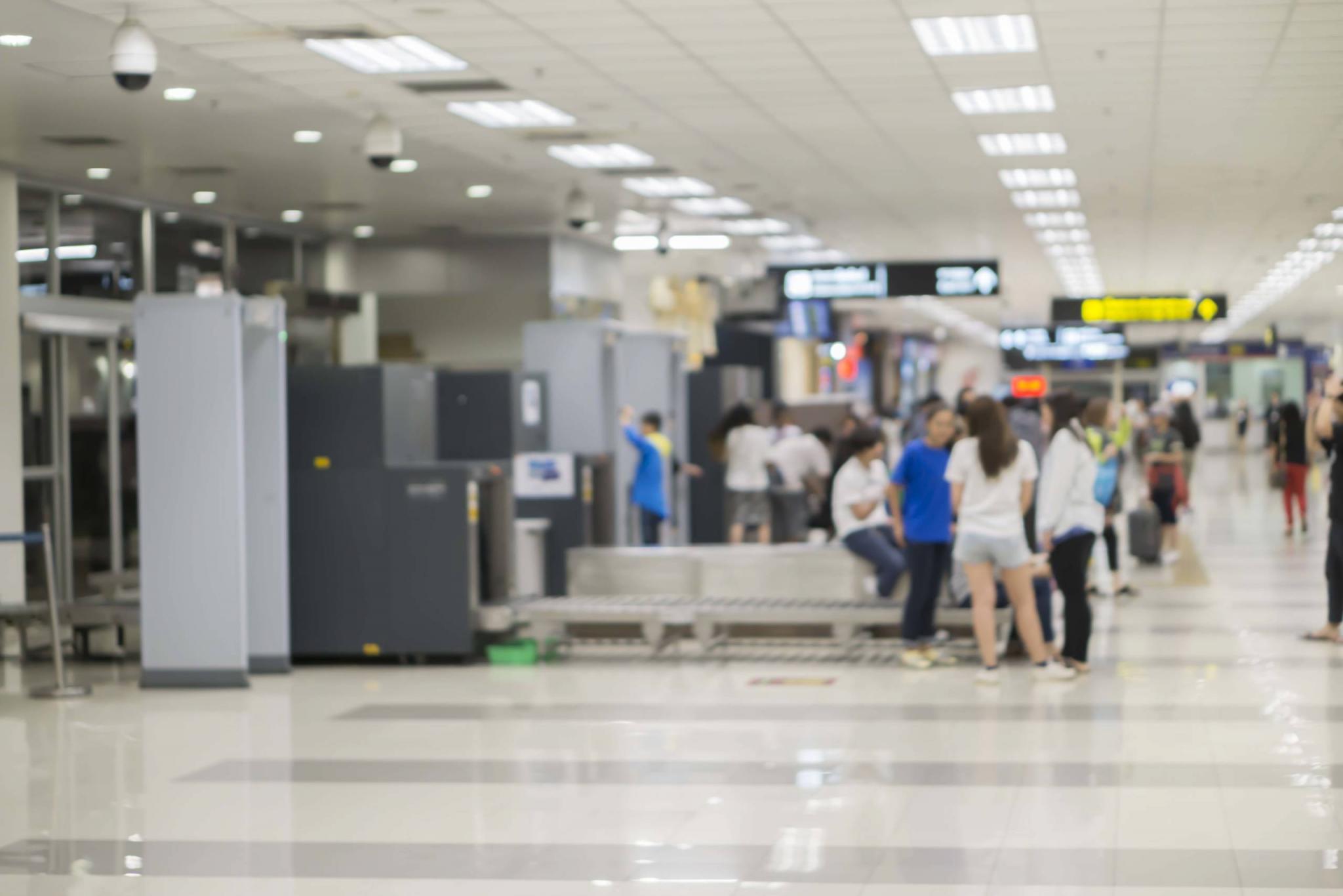 TSA,Security Checkpoint,Airport Check In ,Security Body and Luggage Scan Machine ,vintage color,blurred background