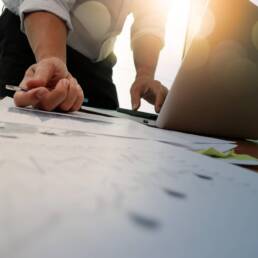 Double exposure of businessman hand working with new modern comp