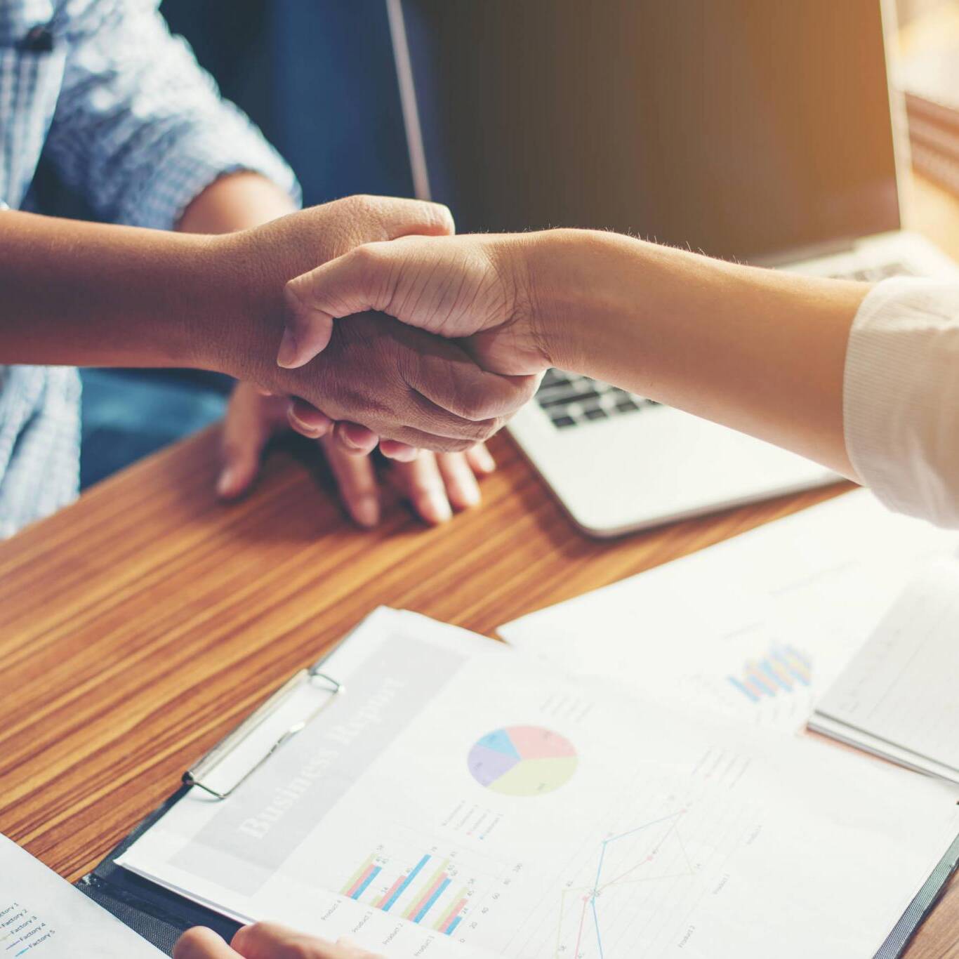 Business People Handshake Greeting Deal at work.