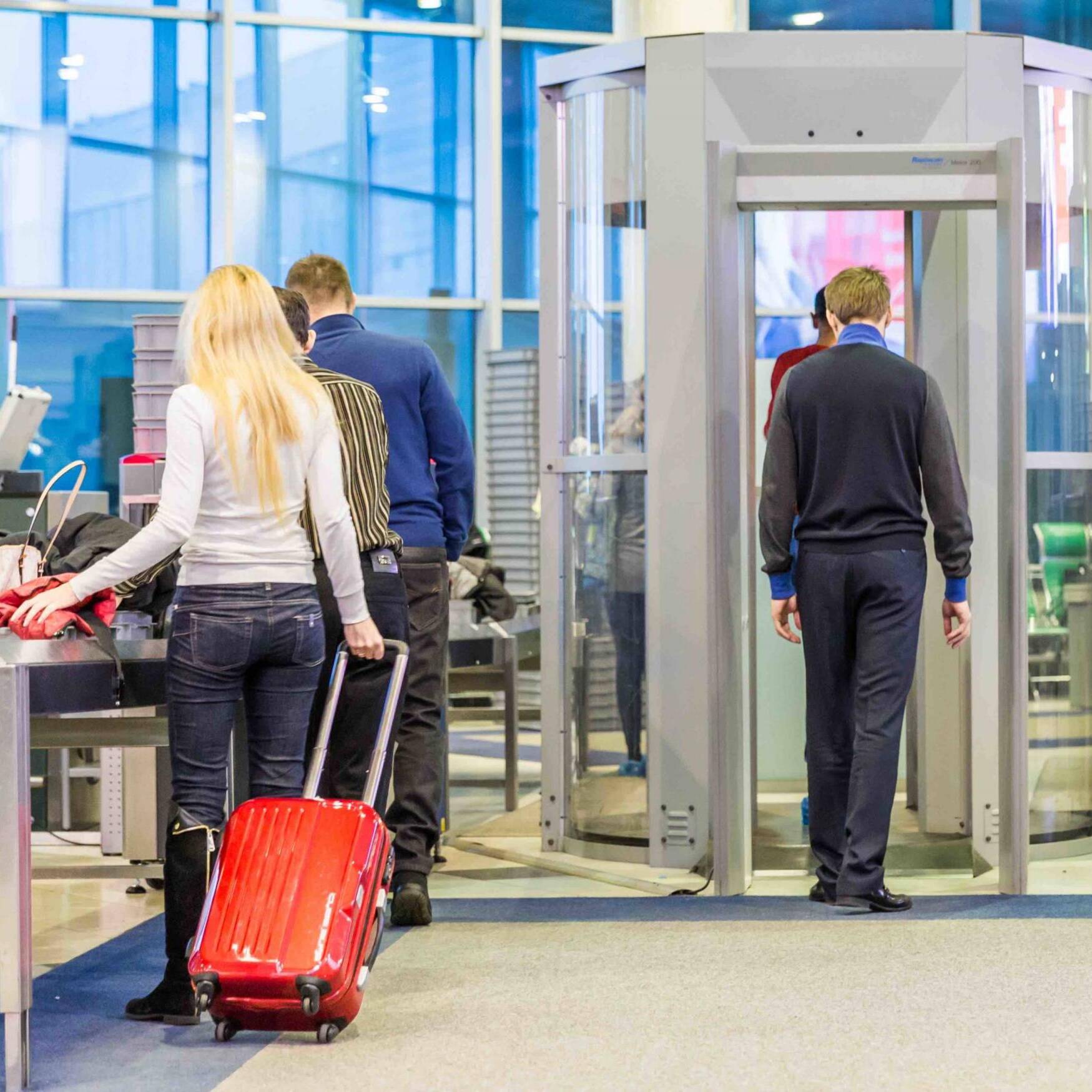 MOSCOW NOVEMBER 23, 2013: people in the hall of the airport Domodedovo November 23, 2014 in Moscow. Domodedovo airport the largest and modern airport of Russia