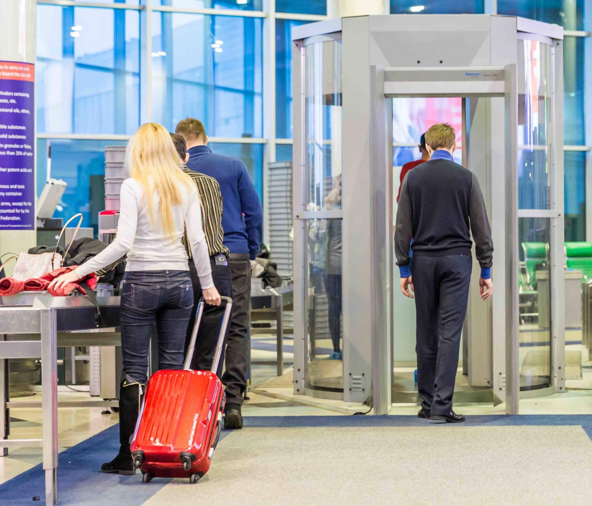 MOSCOW NOVEMBER 23, 2013: people in the hall of the airport Domodedovo November 23, 2014 in Moscow. Domodedovo airport the largest and modern airport of Russia