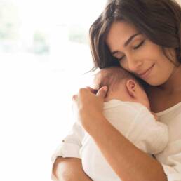 Woman with newborn baby