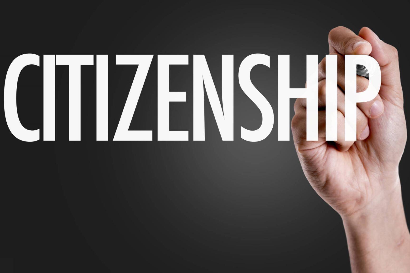 Hand writing the text: Citizenship