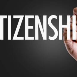 Hand writing the text: Citizenship