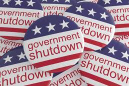 USA Politics News Badges: Pile of Government Shutdown Buttons With US Flag, 3d illustration