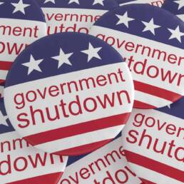 USA Politics News Badges: Pile of Government Shutdown Buttons With US Flag, 3d illustration