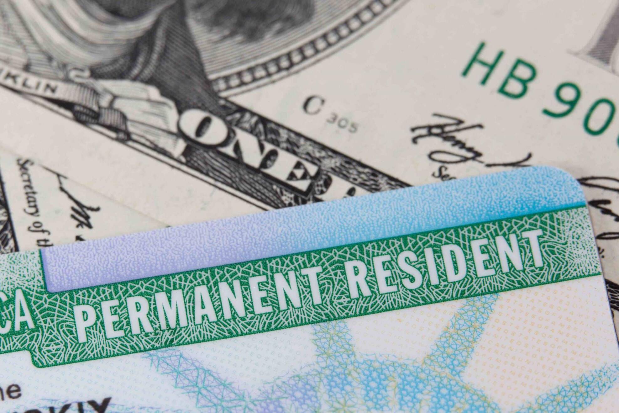 USA Permanent Resident card aka Green Card and paper money