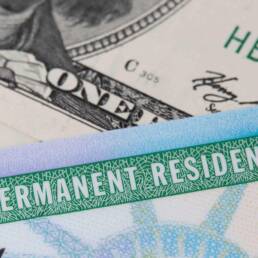 USA Permanent Resident card aka Green Card and paper money