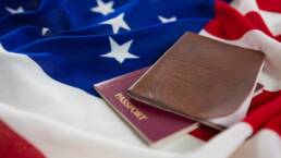 Passport and visa on an American flag