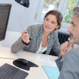 man dealing with a financial adviser at the bank