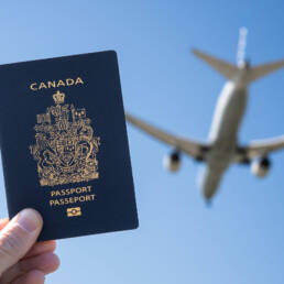 Canadian Passport with Airplane in the Background